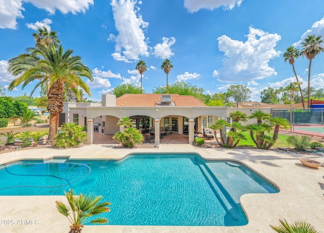 5540 E Mercer Ln, Scottsdale, AZ 85254 - swimming pool with a patio and french doors