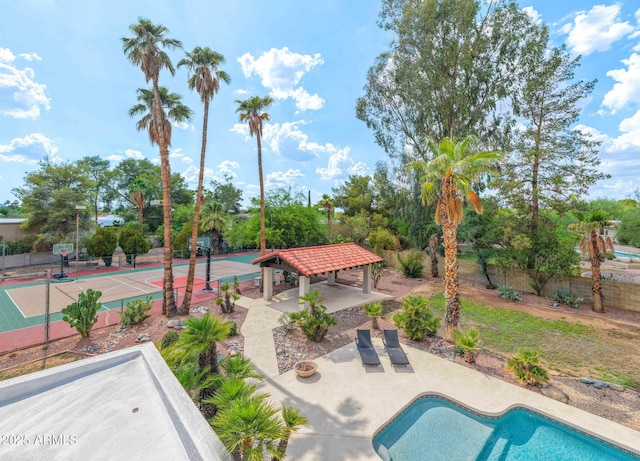 5540 E Mercer Ln, Scottsdale, AZ 85254 - view of swimming pool with a gazebo, a tennis court, and a patio area