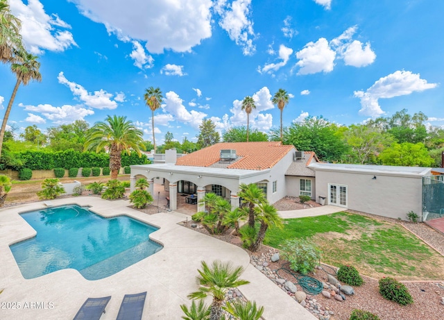 5540 E Mercer Ln, Scottsdale, AZ 85254 - view of swimming pool featuring french doors and a patio