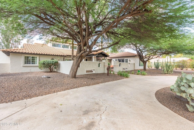 5540 E Mercer Ln, Scottsdale, AZ 85254 - mediterranean / spanish-style home featuring stucco siding and a tiled roof
