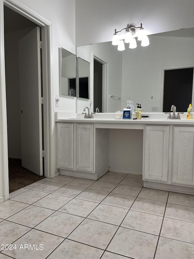 bathroom featuring tile patterned floors and vanity