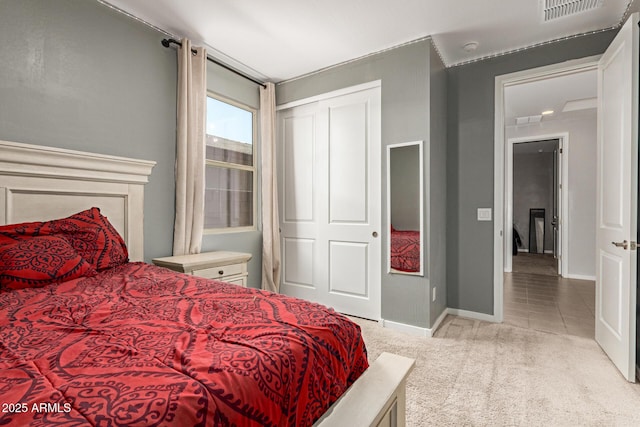 17344 W Red Fox Rd, Surprise, AZ 85387 - bedroom featuring visible vents, carpet, baseboards, and a closet