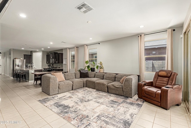 17344 W Red Fox Rd, Surprise, AZ 85387 - living room with visible vents, recessed lighting, and light tile patterned floors