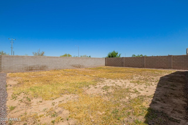 17344 W Red Fox Rd, Surprise, AZ 85387 - view of yard with a fenced backyard