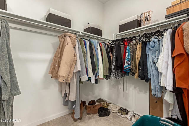 17344 W Red Fox Rd, Surprise, AZ 85387 - walk in closet featuring carpet floors