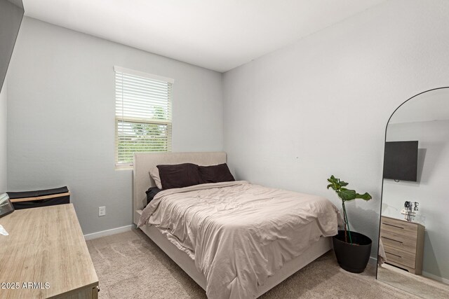 17344 W Red Fox Rd, Surprise, AZ 85387 - bedroom featuring baseboards and light colored carpet