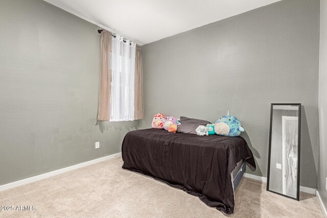 17344 W Red Fox Rd, Surprise, AZ 85387 - bedroom with carpet flooring and baseboards