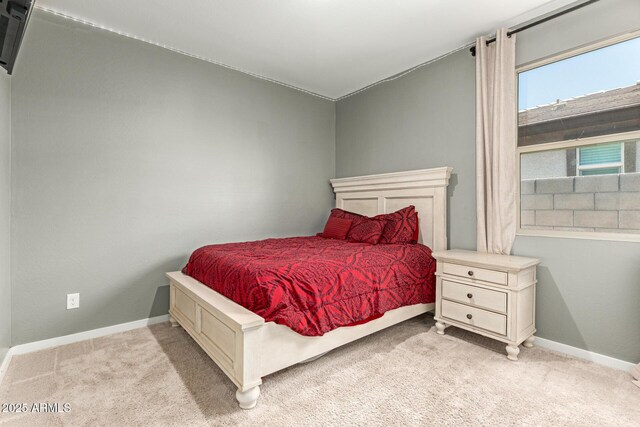 17344 W Red Fox Rd, Surprise, AZ 85387 - bedroom with baseboards and light colored carpet