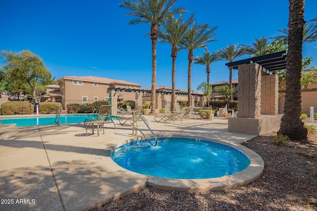 community pool featuring a patio area