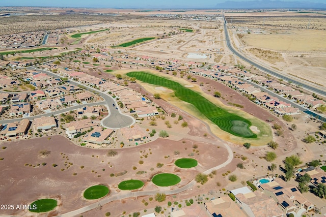 bird's eye view with view of golf course