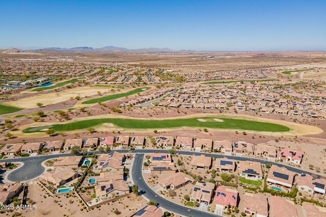 aerial view featuring golf course view, a residential view, and a mountain view