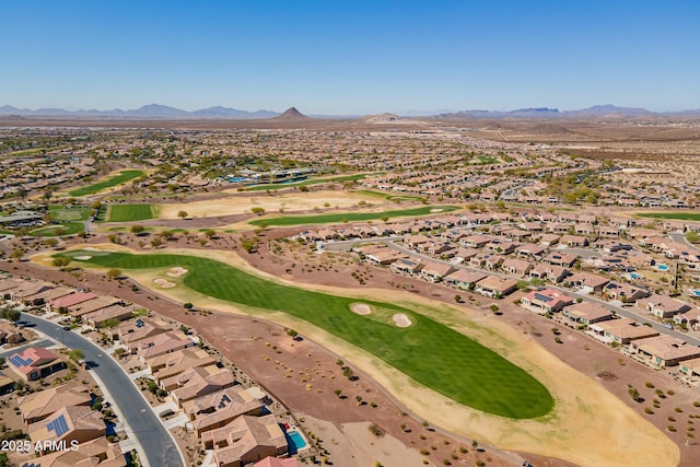 birds eye view of property with golf course view, a residential view, and a mountain view