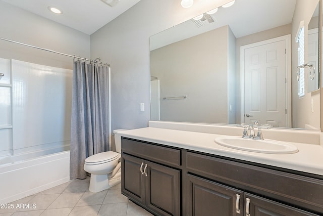 full bathroom with shower / bath combo, visible vents, toilet, tile patterned flooring, and vanity