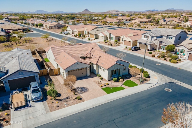 bird's eye view featuring a residential view and a mountain view