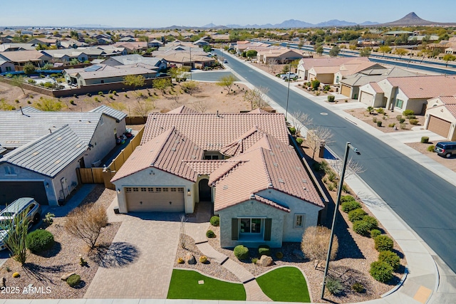 bird's eye view featuring a residential view and a mountain view