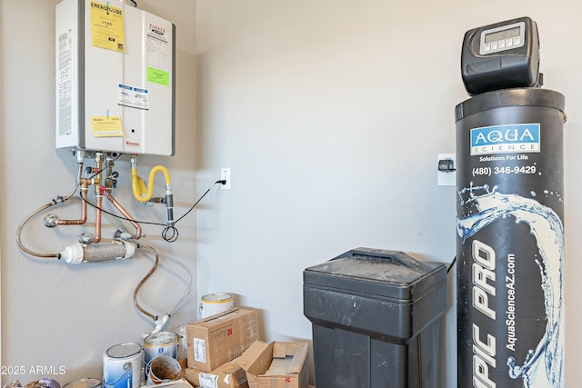 utility room with tankless water heater