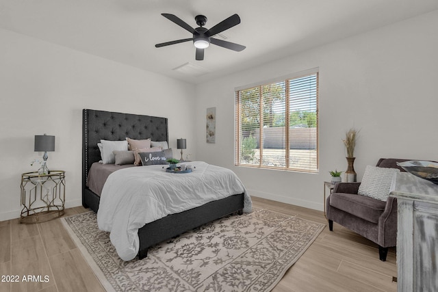 bedroom featuring ceiling fan and light wood-type flooring