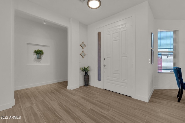 entrance foyer featuring light hardwood / wood-style flooring