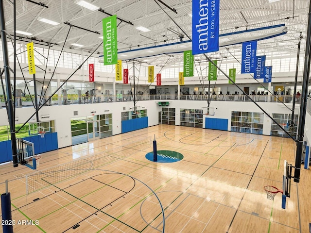 view of basketball court featuring community basketball court and fence