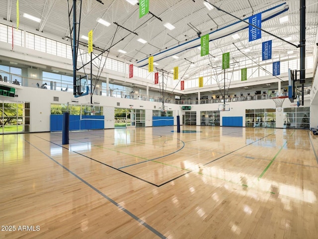 view of basketball court with community basketball court and fence