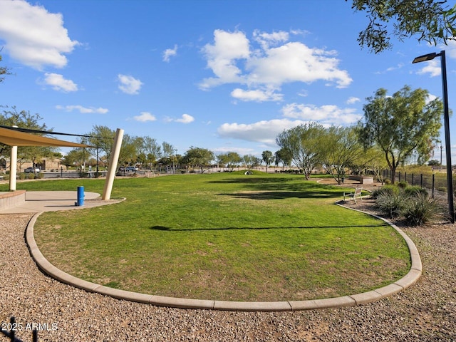 view of home's community featuring a lawn