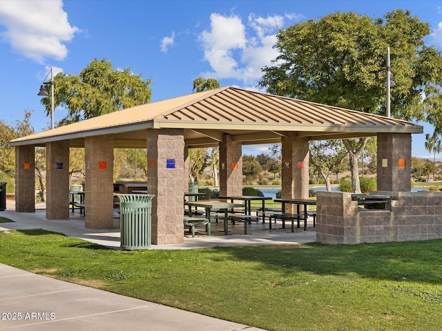 view of home's community with a gazebo and a yard