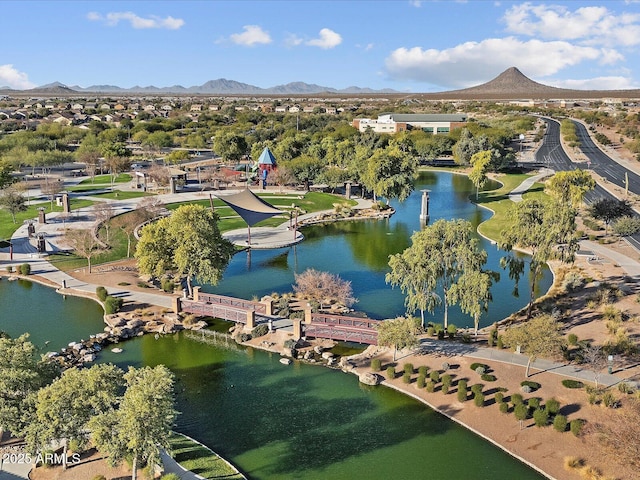 bird's eye view with a water and mountain view