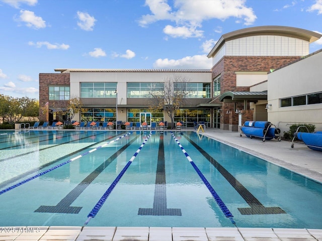 pool with a patio area