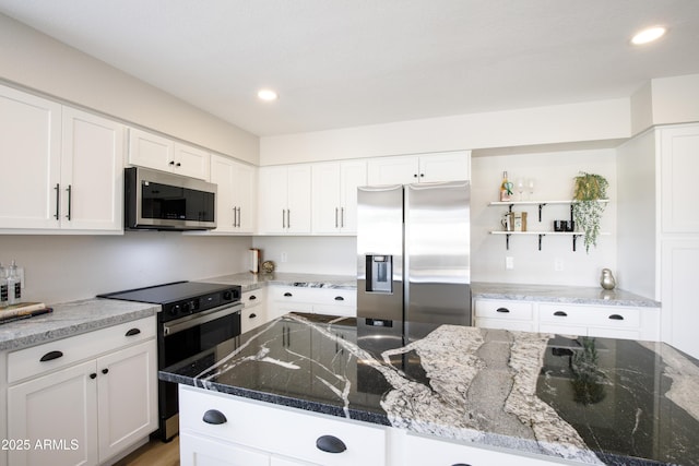 18818 N 95th Ave, Peoria, AZ 85382 - kitchen featuring recessed lighting, white cabinets, appliances with stainless steel finishes, and open shelves