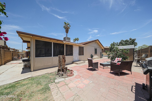 4623 W Solano Dr S S, Unit South, Glendale, AZ 85301 - rear view of house featuring a patio area, a fenced backyard, a sunroom, and outdoor lounge area