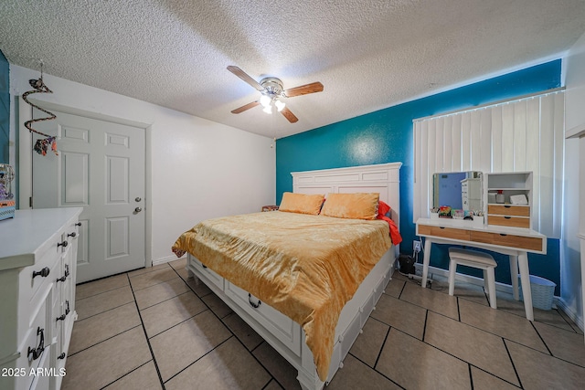 4623 W Solano Dr S S, Unit South, Glendale, AZ 85301 - tiled bedroom with a textured ceiling and a ceiling fan