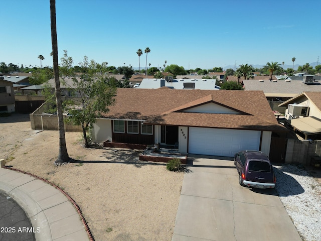 4623 W Solano Dr S S, Unit South, Glendale, AZ 85301 - single story home featuring a shingled roof, a garage, driveway, and a residential view