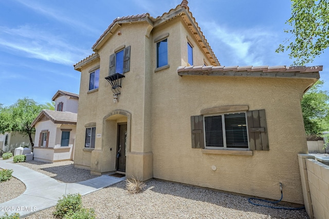 14881 W Ashland Ave, Goodyear, AZ 85395 - mediterranean / spanish-style home featuring stucco siding and a tiled roof