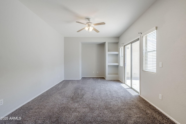 14881 W Ashland Ave, Goodyear, AZ 85395 - unfurnished bedroom with carpet, baseboards, ceiling fan, and access to outside