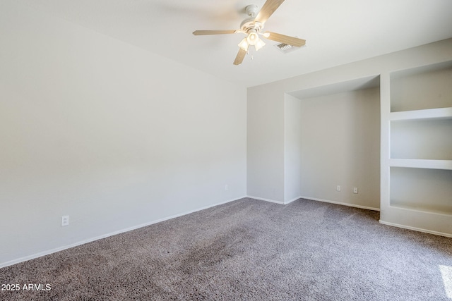 14881 W Ashland Ave, Goodyear, AZ 85395 - carpeted spare room with ceiling fan and baseboards