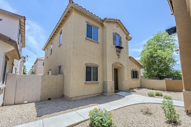 14881 W Ashland Ave, Goodyear, AZ 85395 - back of property featuring stucco siding and a tiled roof