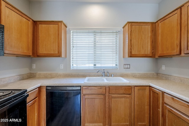 14881 W Ashland Ave, Goodyear, AZ 85395 - kitchen featuring black appliances, a sink, and light countertops