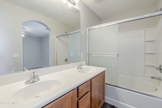 14881 W Ashland Ave, Goodyear, AZ 85395 - bathroom featuring enclosed tub / shower combo and double vanity