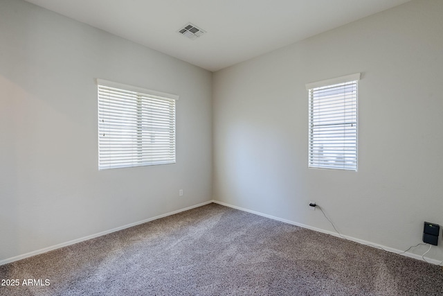 14881 W Ashland Ave, Goodyear, AZ 85395 - empty room with carpet flooring and baseboards