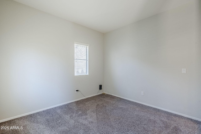 14881 W Ashland Ave, Goodyear, AZ 85395 - carpeted spare room featuring baseboards