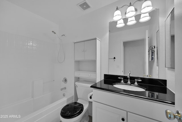 full bathroom featuring tub / shower combination, toilet, and vanity