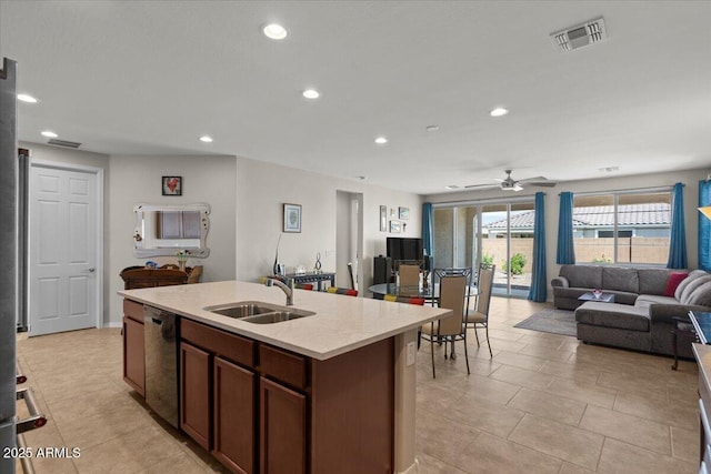 22912 E Domingo Rd, Queen Creek, AZ 85142 - kitchen featuring a sink, open floor plan, dishwasher, visible vents, and recessed lighting