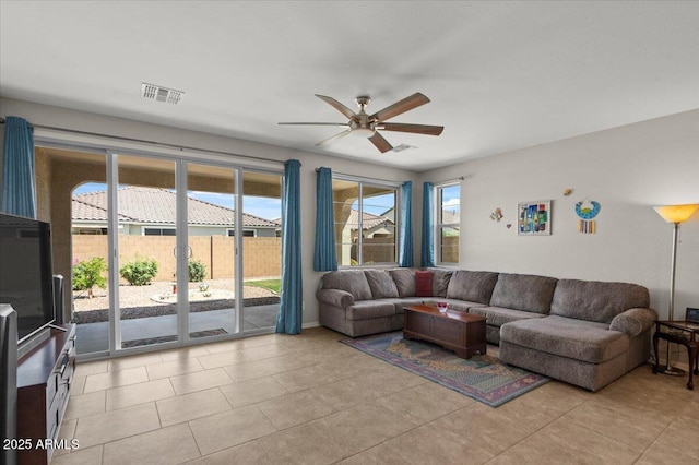 22912 E Domingo Rd, Queen Creek, AZ 85142 - living room with a ceiling fan, visible vents, and light tile patterned floors