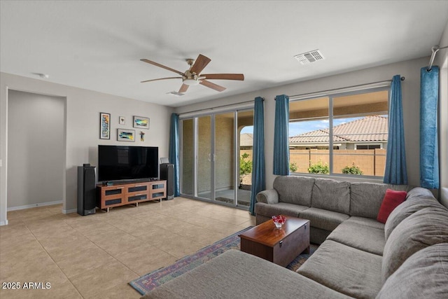 22912 E Domingo Rd, Queen Creek, AZ 85142 - living area with ceiling fan, baseboards, visible vents, and light tile patterned floors