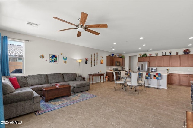 22912 E Domingo Rd, Queen Creek, AZ 85142 - living room featuring recessed lighting, visible vents, a ceiling fan, and light tile patterned flooring