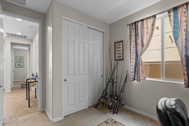 22912 E Domingo Rd, Queen Creek, AZ 85142 - rec room with baseboards, light carpet, and visible vents