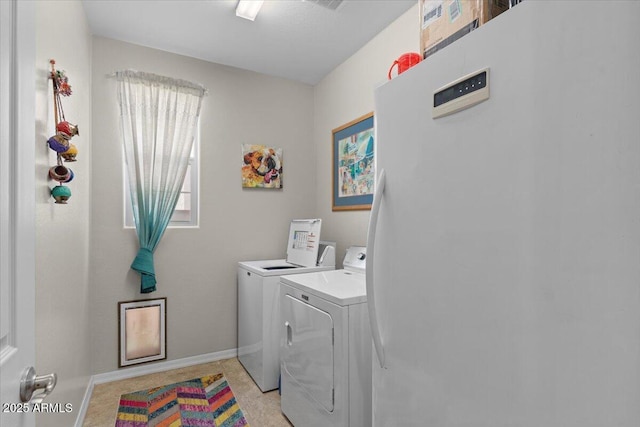 22912 E Domingo Rd, Queen Creek, AZ 85142 - laundry area with washing machine and dryer, baseboards, and laundry area