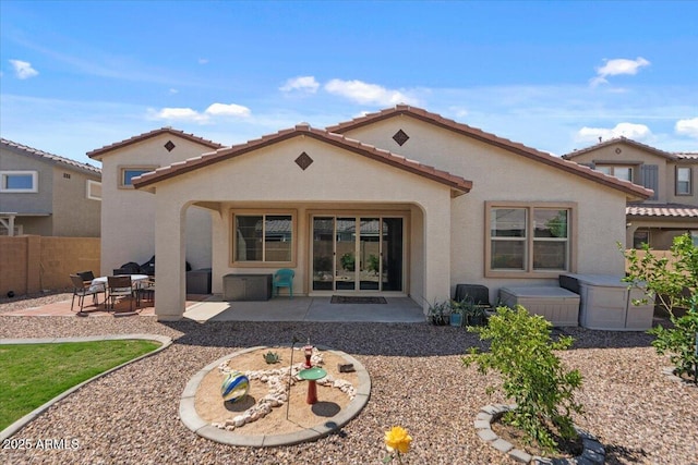 22912 E Domingo Rd, Queen Creek, AZ 85142 - rear view of property with fence, a patio, a tiled roof, and stucco siding