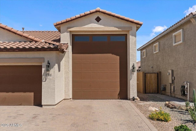 22912 E Domingo Rd, Queen Creek, AZ 85142 - view of front of home featuring stucco siding, a tile roof, and a garage