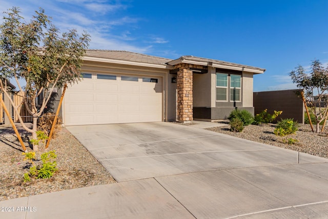 view of front of home with a garage